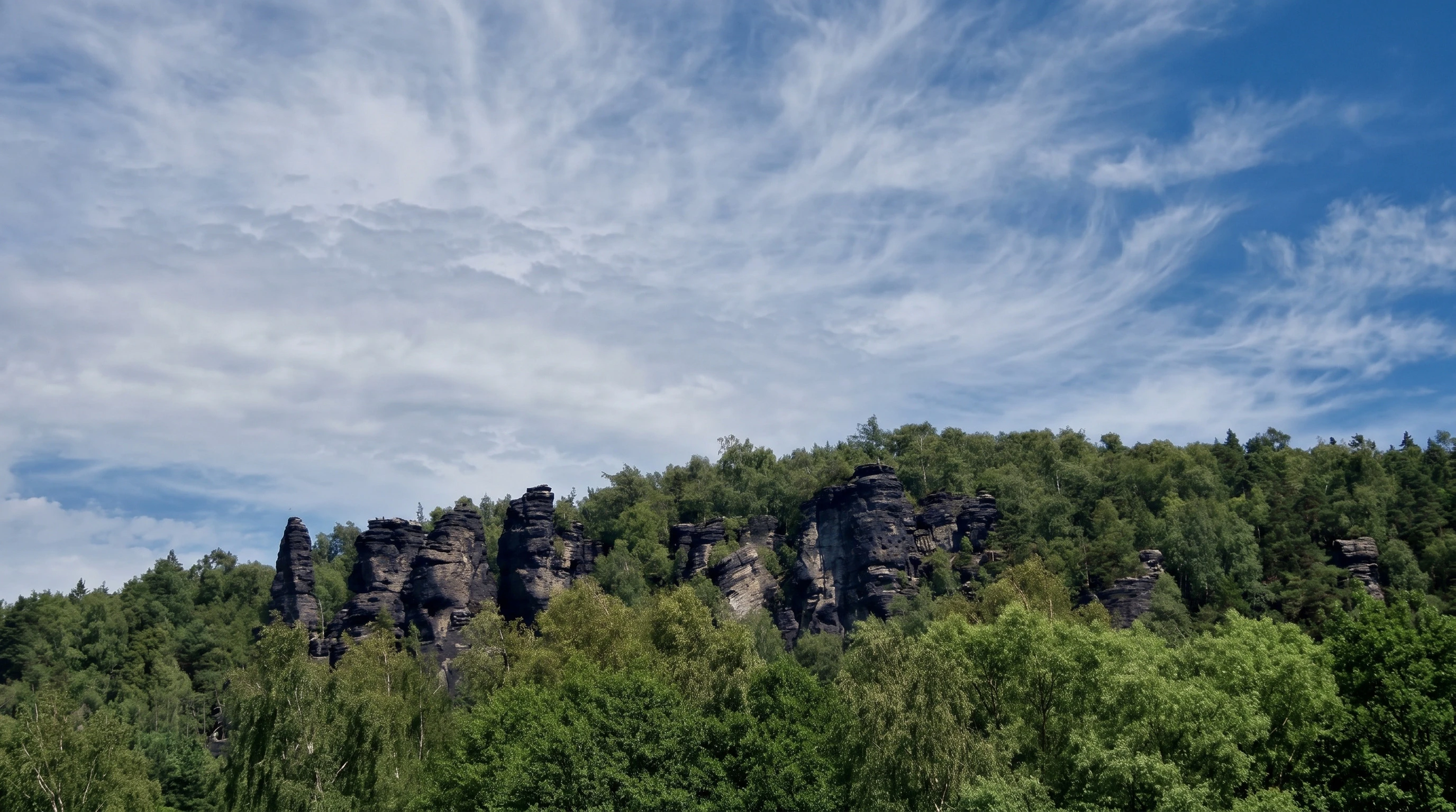 Ostrov rocks visible from the Pod Císařem campsite